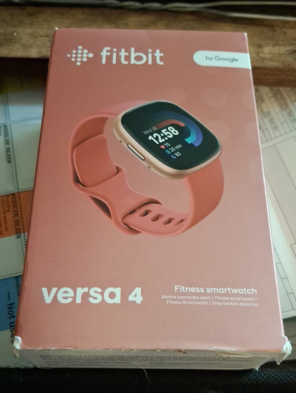 fitbit Versa 4 Smartwatch - Pink Band with Rose Gold Case